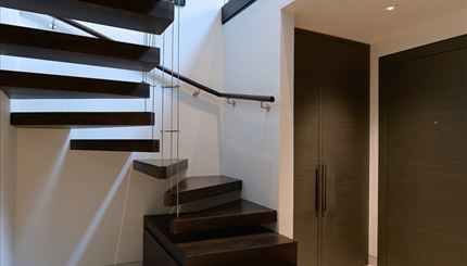Staircase down to bedrooms